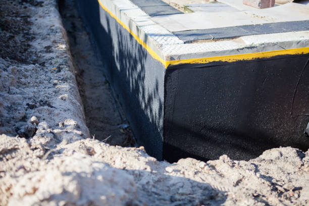 Professional Waterproofing technician working in LaGrange, GA